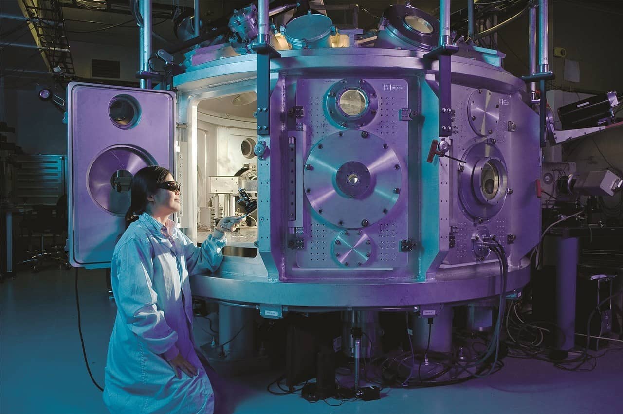 Scientist looking at a reactor